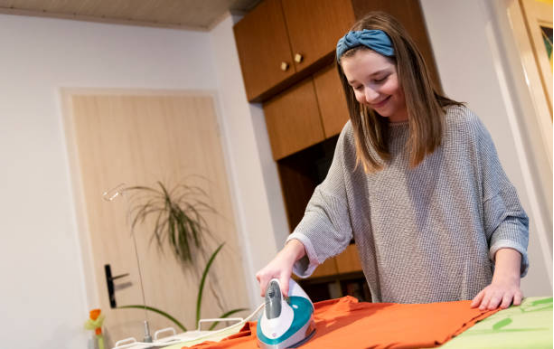 How Ironing Boards Influence Ironing Habit Formation 2 Stable ironing board supporting comfortable ironing posture