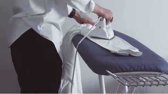 How Ironing Boards Influence Ironing Habit Formation 3 Ironing board stored for easy accessibility in home